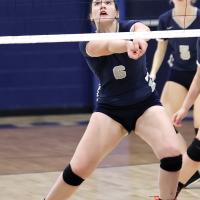 Jewell Graham makes a dig near the net