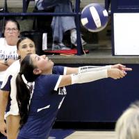 Makenna Curtis makes a dig off a kill attempt