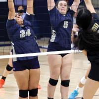 Trinity Black and Jewell Graham set up for a double block attempt