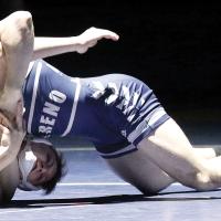 Brandon Harrison works on a pinning move