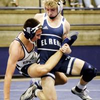 Dailey Jennings works on a takedown of Trevor Robinson
