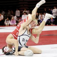 Foxx Kurtz tries to turn his opponent for takedown points