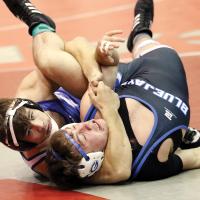 Thad Hicks works a pinning move on an opponent