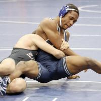 George Stewart tries to pull his way out of a takedown move