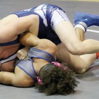 Will Heger tries to turn the shoulders of Jayden Fuston