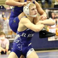 Dailey Jennings works on a takedown