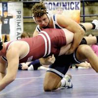 Mikey Devereaux controls the legs of Izaha Freeborn