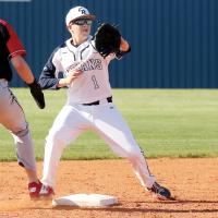 Ty Vincent eyes a pickoff throw to the bag