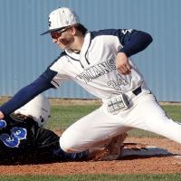 Mason Fulton uses his glove and a base runner to block a low pickoff throw