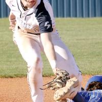 Gavin Tinsley reaches out to tag a Piedmont runner at second base