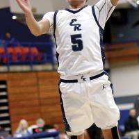 Carter Roman Nose eyes the basket as he leaps for a slam dunk
