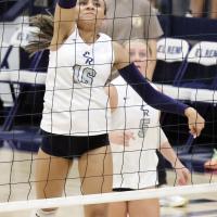 Mary Gonzalez hits a kill attempt over the net