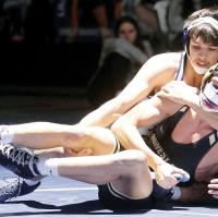 Trevor Robinson sets up a Midwest City opponent for a pinning move