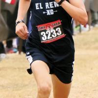Ethan Brooks runs toward the finish line