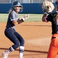 Iliana Ashford hits the brakes as she tries to keep from getting tagged