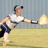 Izzy Birdsong focuses on the ball as she tries to run under a potential hit