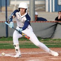 Mason Fulton drops down a bunt which ended up driving in two runs