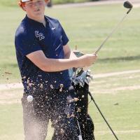 Baylor Pearson blasts out of a green side bunker