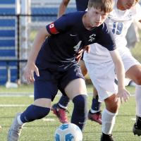 Tristan Chandler dribbles his way through traffic