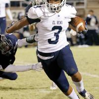 Malachi Nicholson pushes off an tackler
