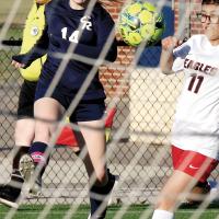 Bri Vickers fires a shot toward the net