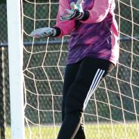 Bri Vickers jumps to make a save