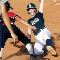 Maddie Moss slides into third base ahead of a pickoff throw