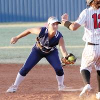 Izzy Choat reaches out to tag a Del City base runner