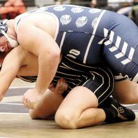 Eric Parker works the back of a Midwest City wrestler