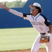 Kyson Jenkins reaches out to grab the baseball