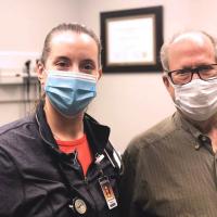 Father Mark Mason and his doctor.