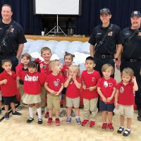 Sacred Heart preschoolers with El Reno firefighters
