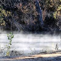 Crisp November air creates a light fog over Lake El Reno