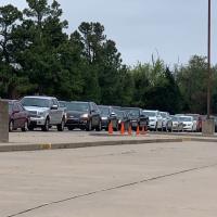 A line of cars at the pod testing site