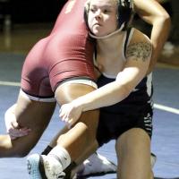 Brooklynn Huggins attempts a double-leg takedown