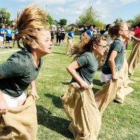 Naomi Rother and classmates Freida Munoz and Kate Pinkerton take off