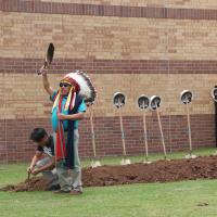 Gordon Yellowman prays over the site 