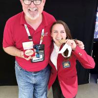 Grace Starks nibbles on her national gold medal