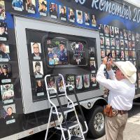 Mike Grimes snaps a photo of the End of Watch Memorial