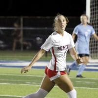 Caroline Huber chases down the ball during a match