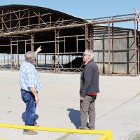 Scott Law and David French look over the 30,000-square-foot Hangar 3