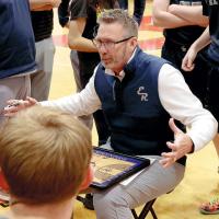 Rodney Haydon goes over a game plan