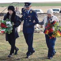 Hildegard Effinger (left) and Jutta Tankersley (right) are escorted by a German Air Force member