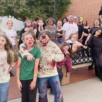 A cast photo of some of the characters from the 2025 Haunted Trolley
