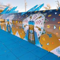 The colorful Native American artwork painted on the Fitness Court