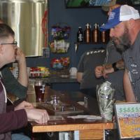 Robinson works behind bar