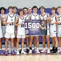 Mueggenborg hits 1,500_story