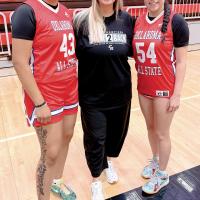 Jennifer Douglas (center) poses for a photo with Lilly Thomas (43) and Emmary Elizondo (54)