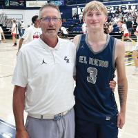 Rodney Haydon poses for a photo with son, Kason