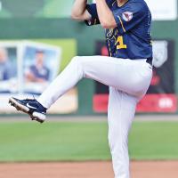Rhett Kouba eyes the plate as he winds up for a pitch